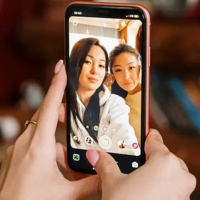 Mother and daughter taking a selfie