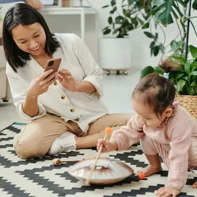 Mother enjoying daughter play time