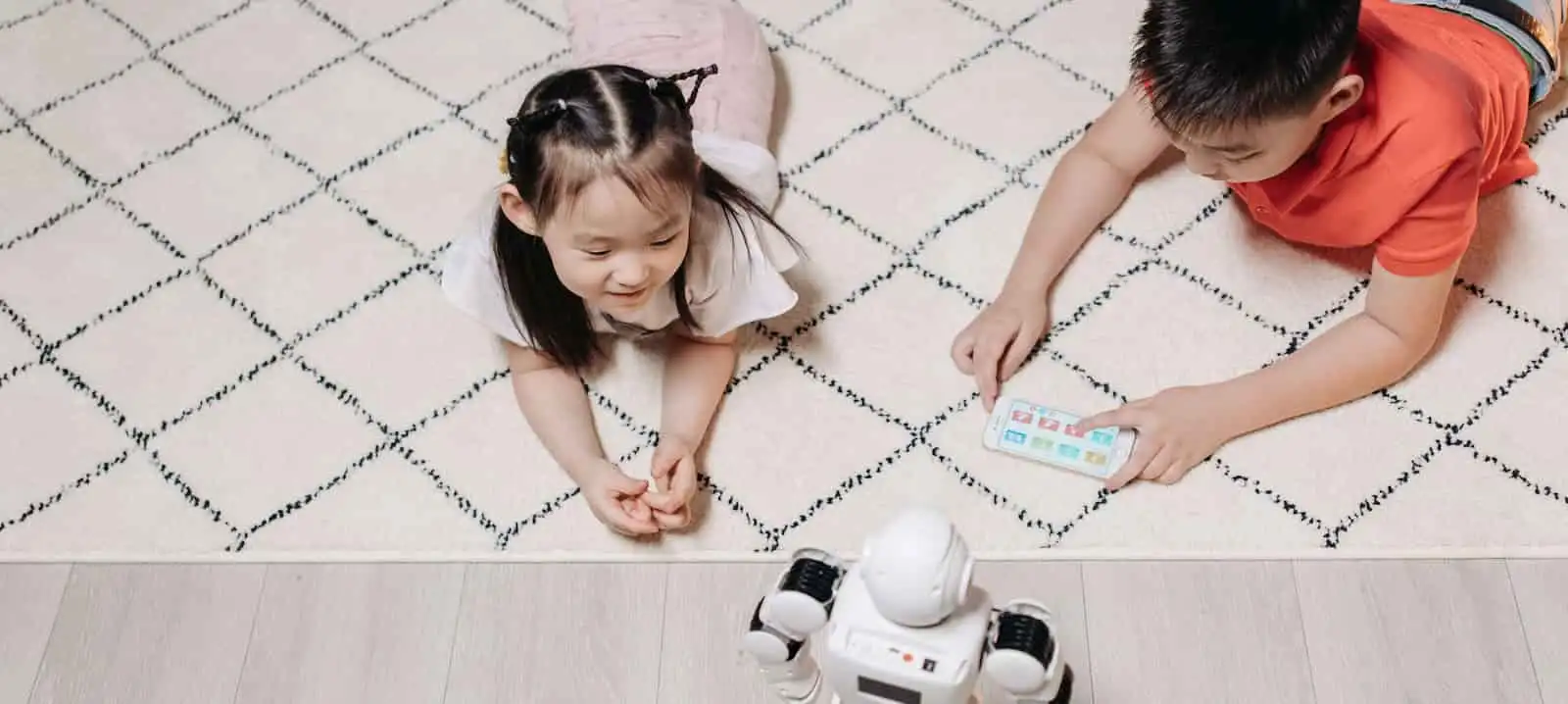 A child having fun with robotics.